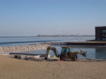 Marina building construction and backhoe